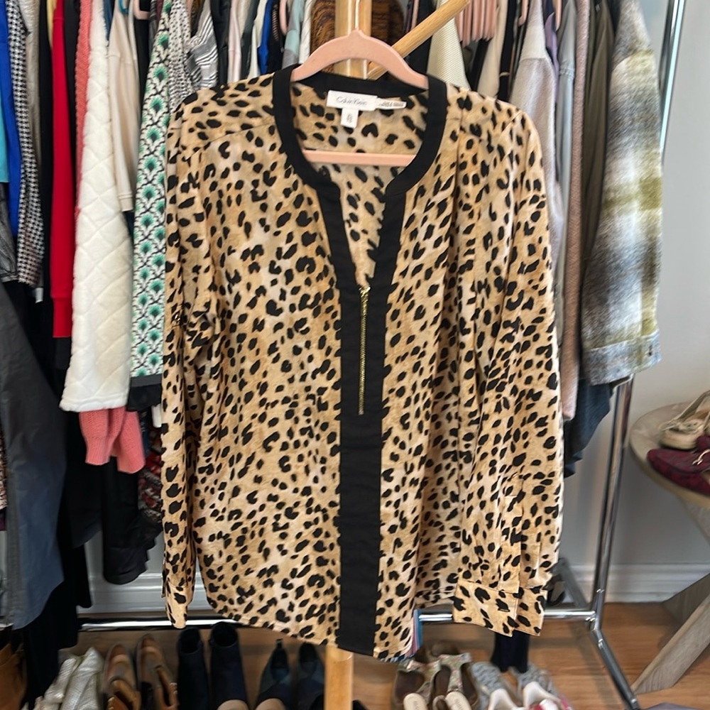 76. Calvin Klein Animal Print Blouse